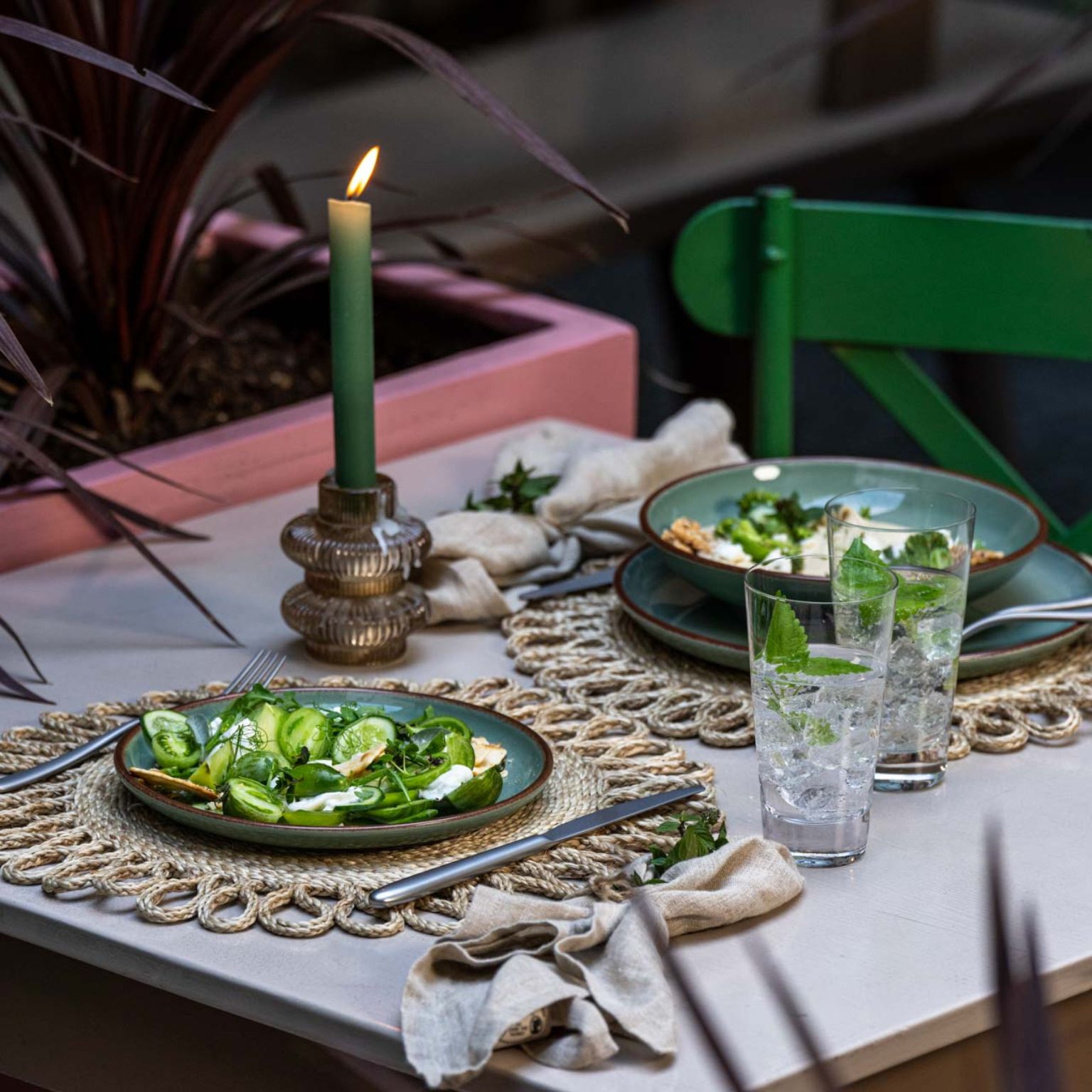 two green Profi Casual plates with salad on it